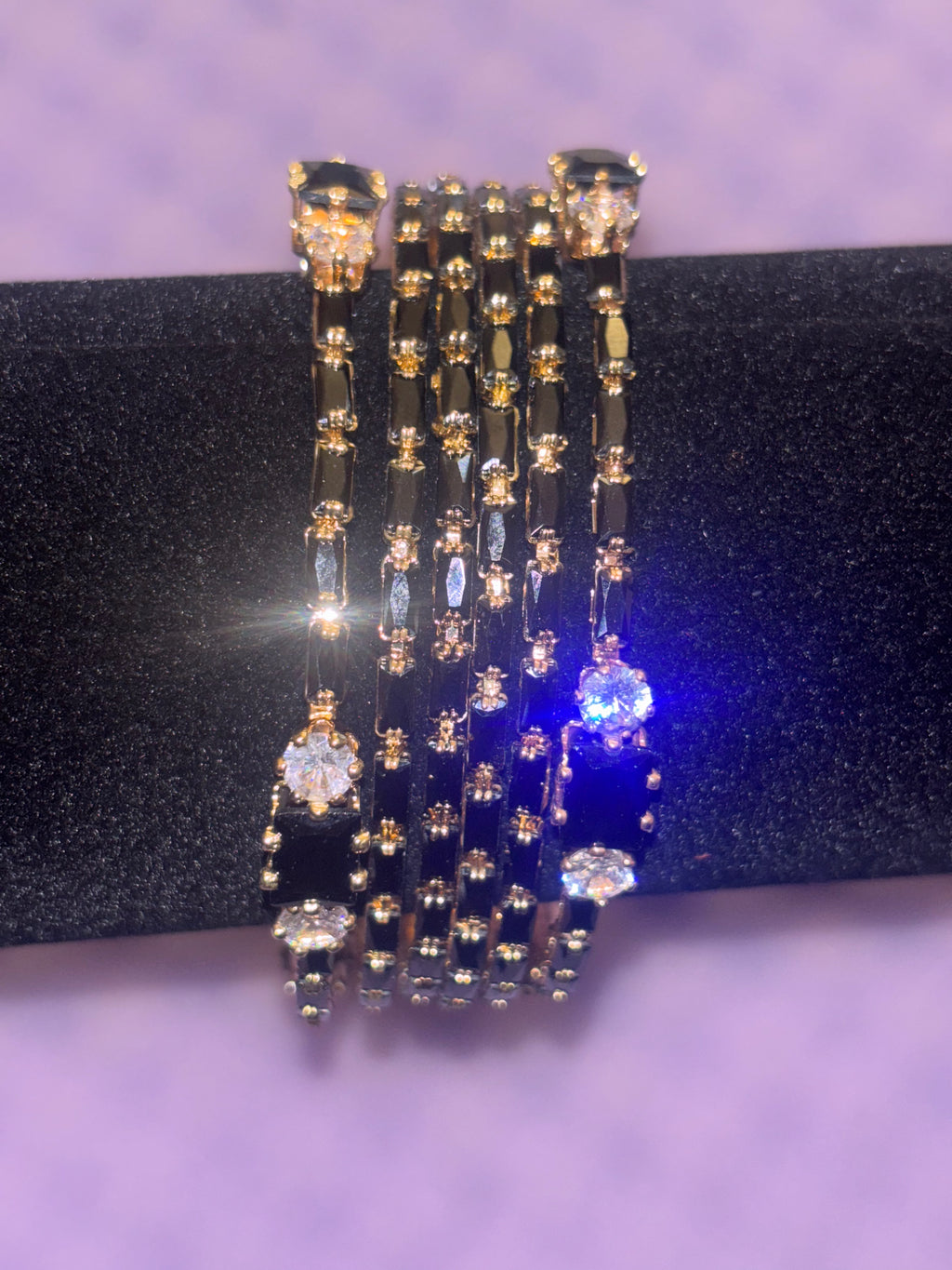 2.6 Gold plated black bangle set