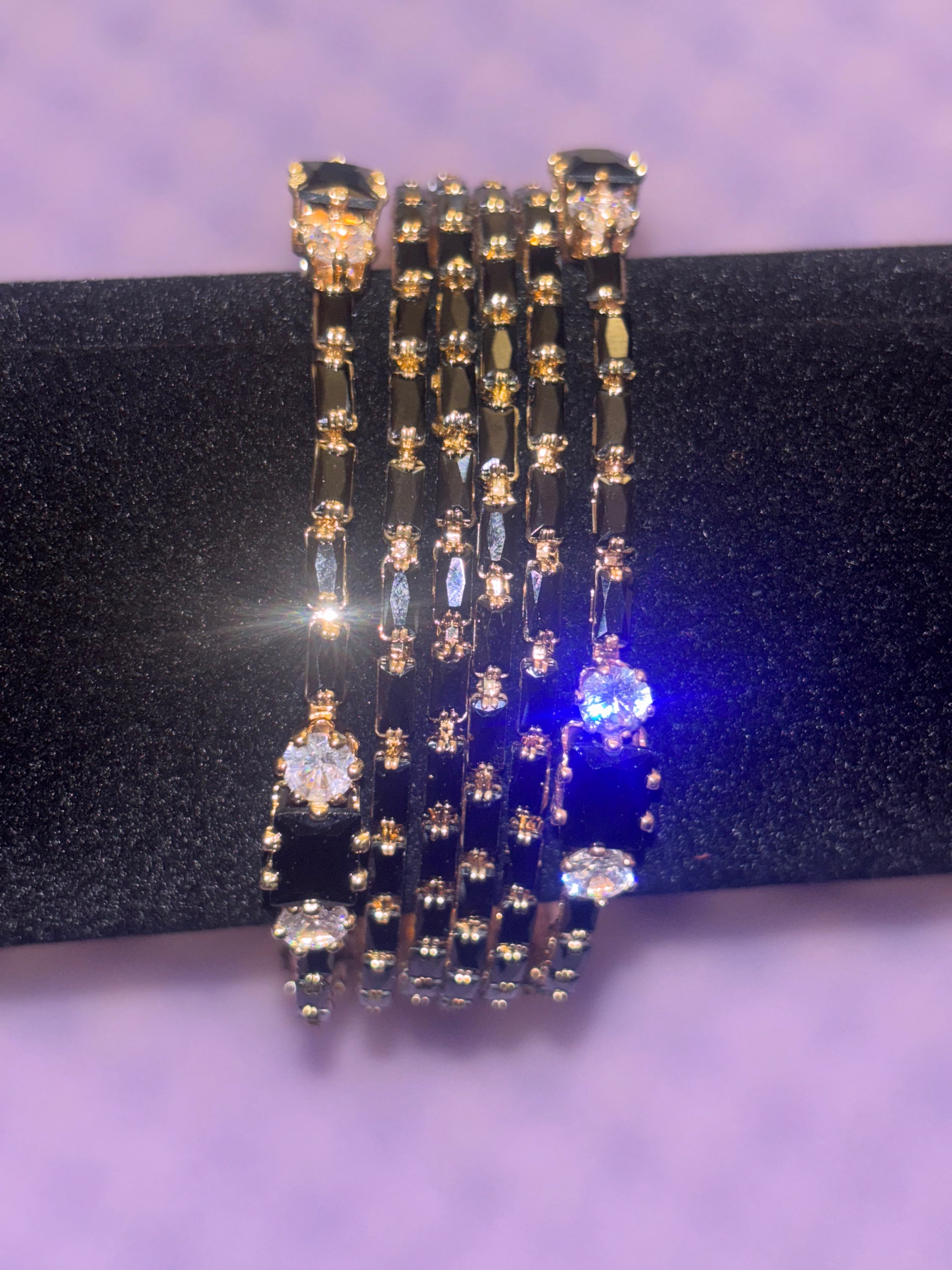 2.6 Gold plated black bangle set