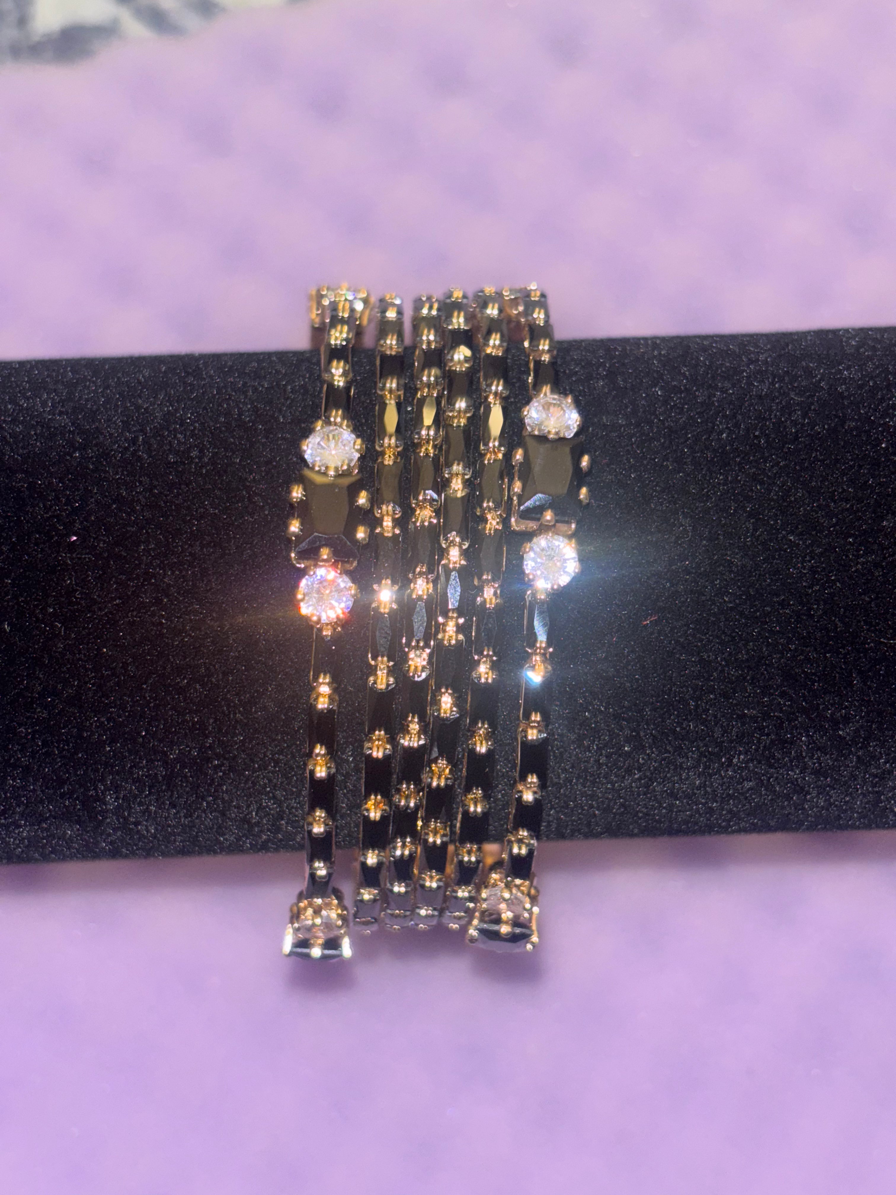 2.6 Gold plated black bangle set