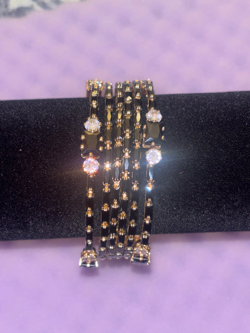 2.6 Gold plated black bangle set