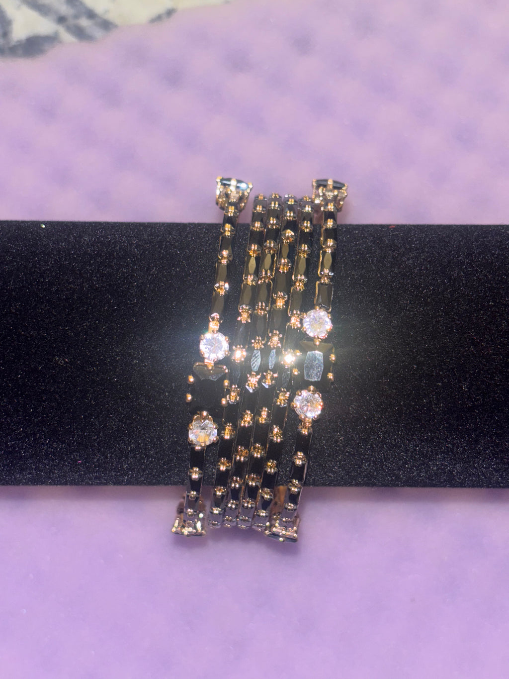 2.6 Gold plated black bangle set
