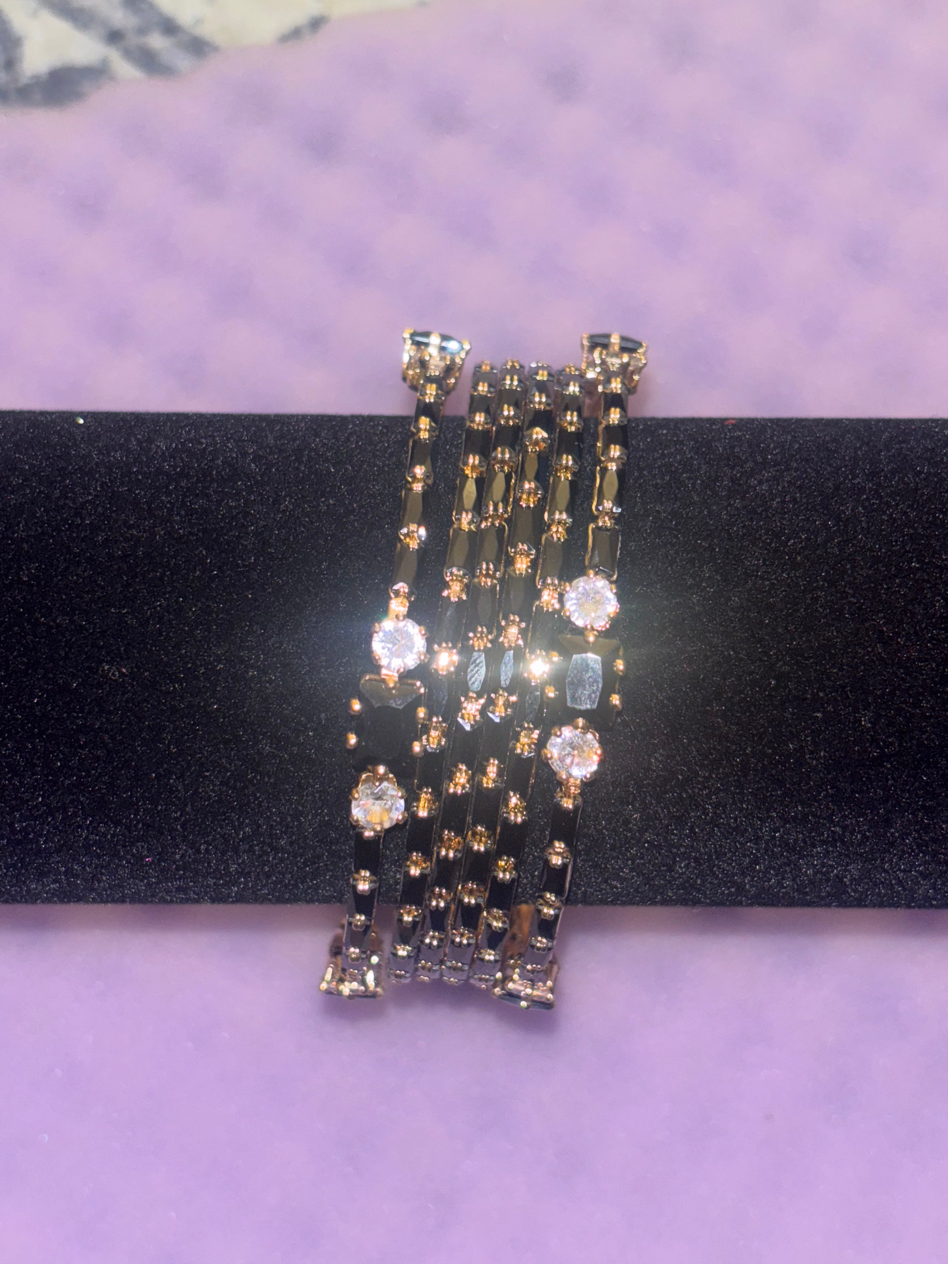 2.6 Gold plated black bangle set
